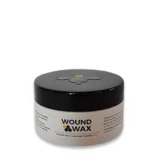 Wound Wax jar with black lid and yellow bee logo, white label with product name.